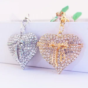 Women's Cute Bowknot Heart Peach Keychain Metal and Plastic Alloy Bag Accessory with Pendant Cartoon Style for Keys